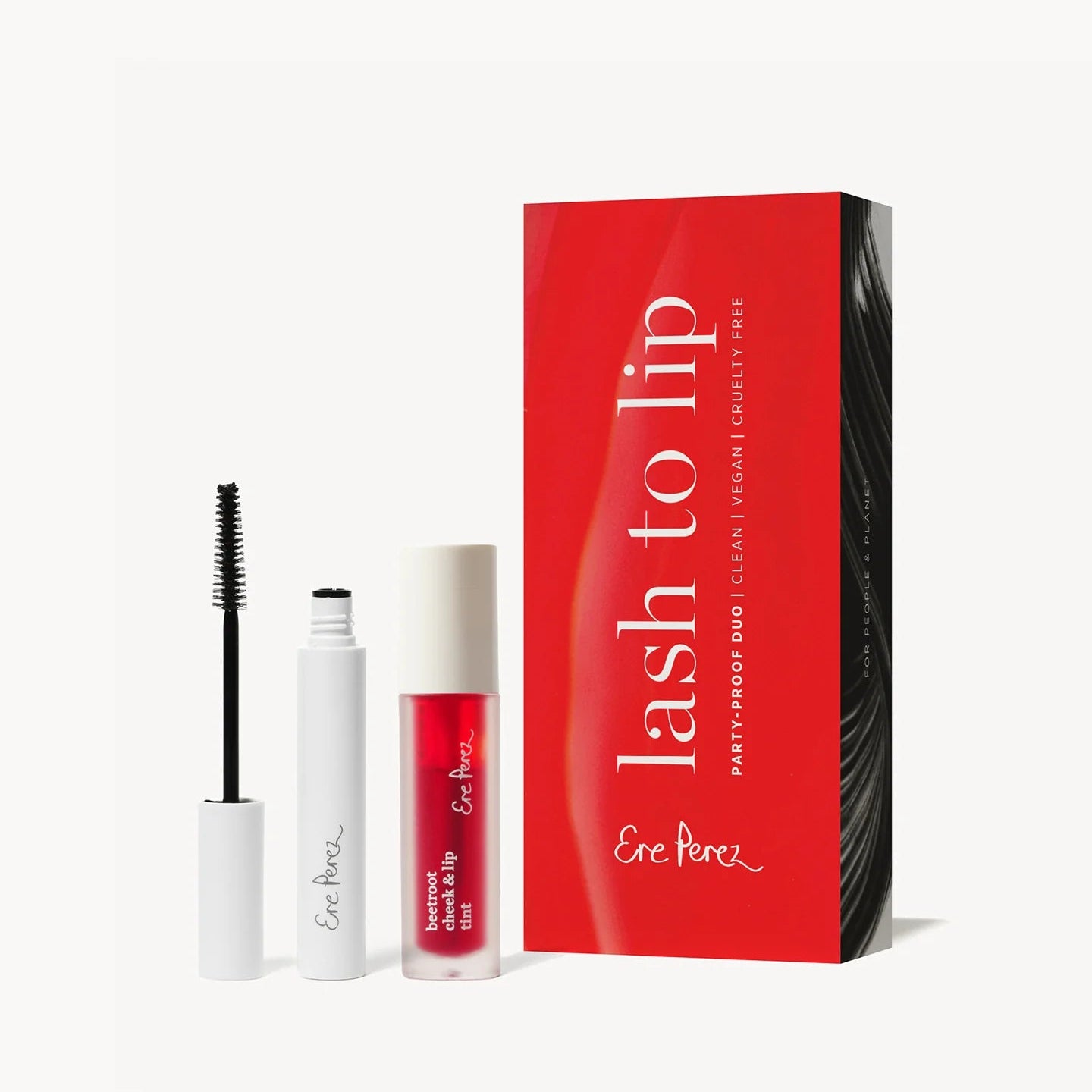 Makeup products including mascara, lip balm, and a red box with 'lash to lip' text on a white background.